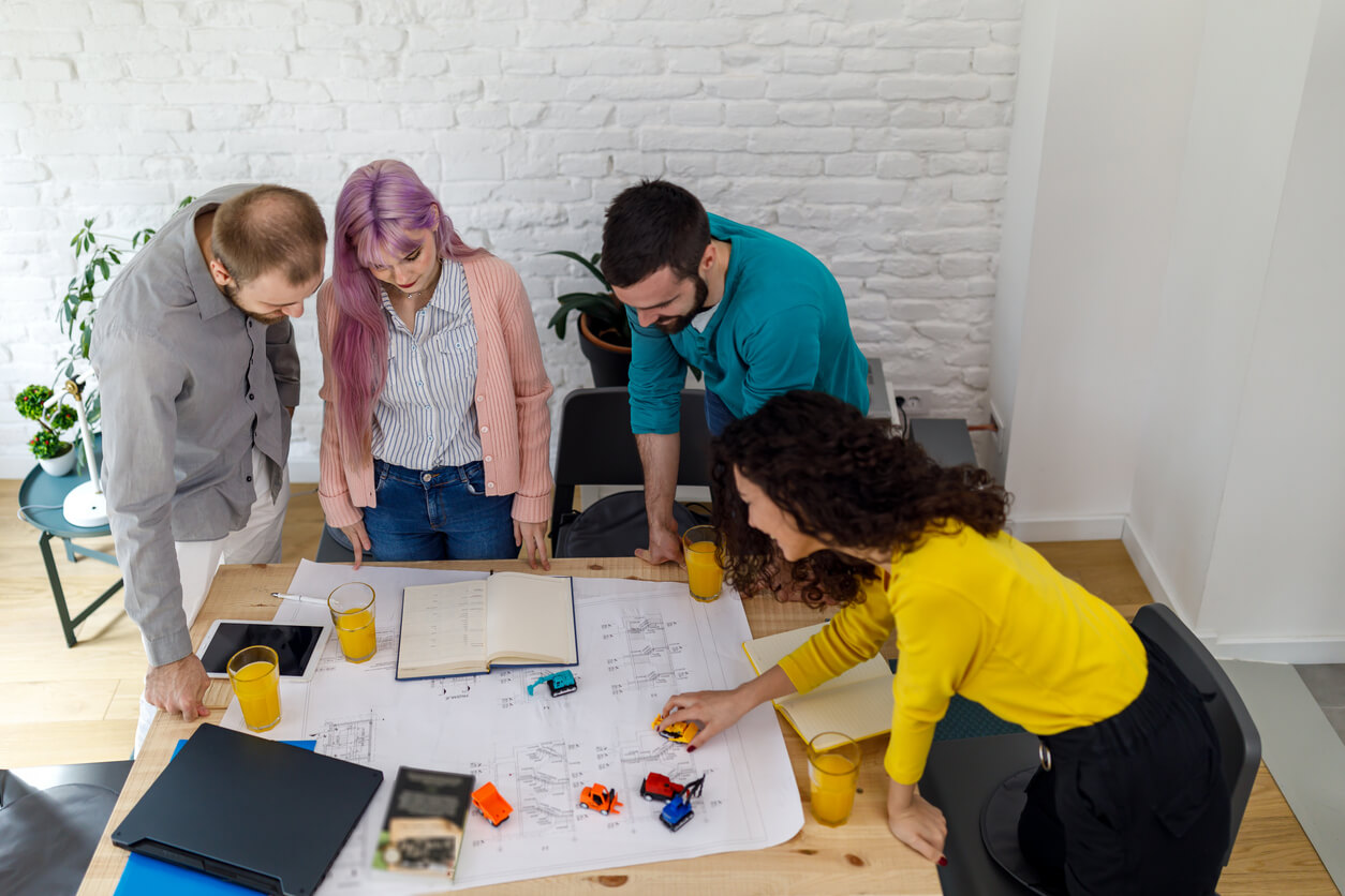 Young students are doing some learning in a modern apartment using a laptop - Top Creative Branding Agencies Worldwide